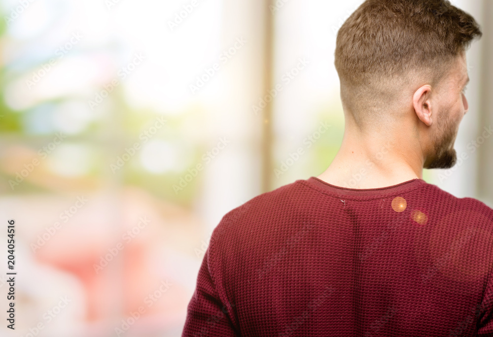 Handsome young man backside, rear view Handsome young man backside, rear view