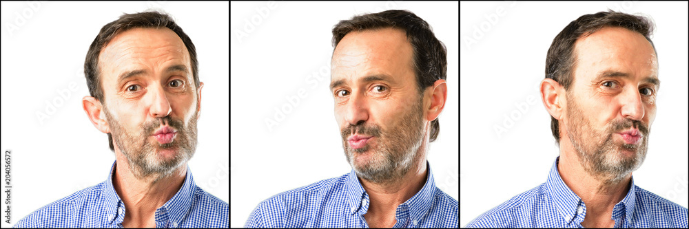 Middle age handsome man closeup expressing love, blows kiss at camera, flirting Middle age handsome man closeup expressing love, blows kiss at camera, flirting