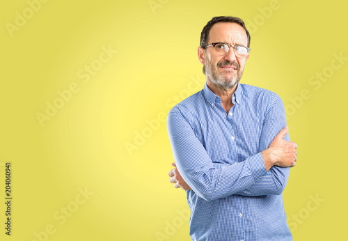 Handsome middle age man nervous and scared biting lips looking camera with impatient expression, pensive © Krakenimages.com