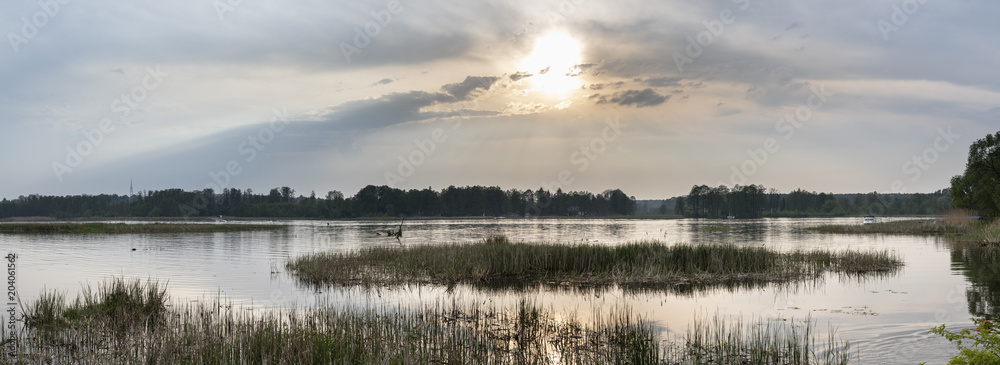 Panorama of sunset over river in Poland
