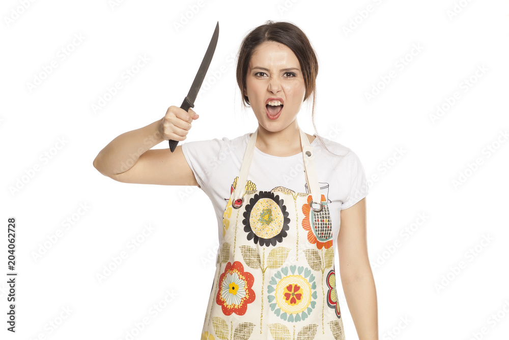angry housewife with knife in her hand on white background angry housewife with knife in her hand on white background