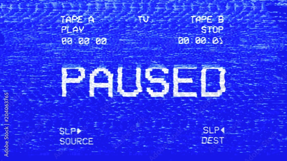 An old damaged VHS tape tracking a bad signal coming from a double deck