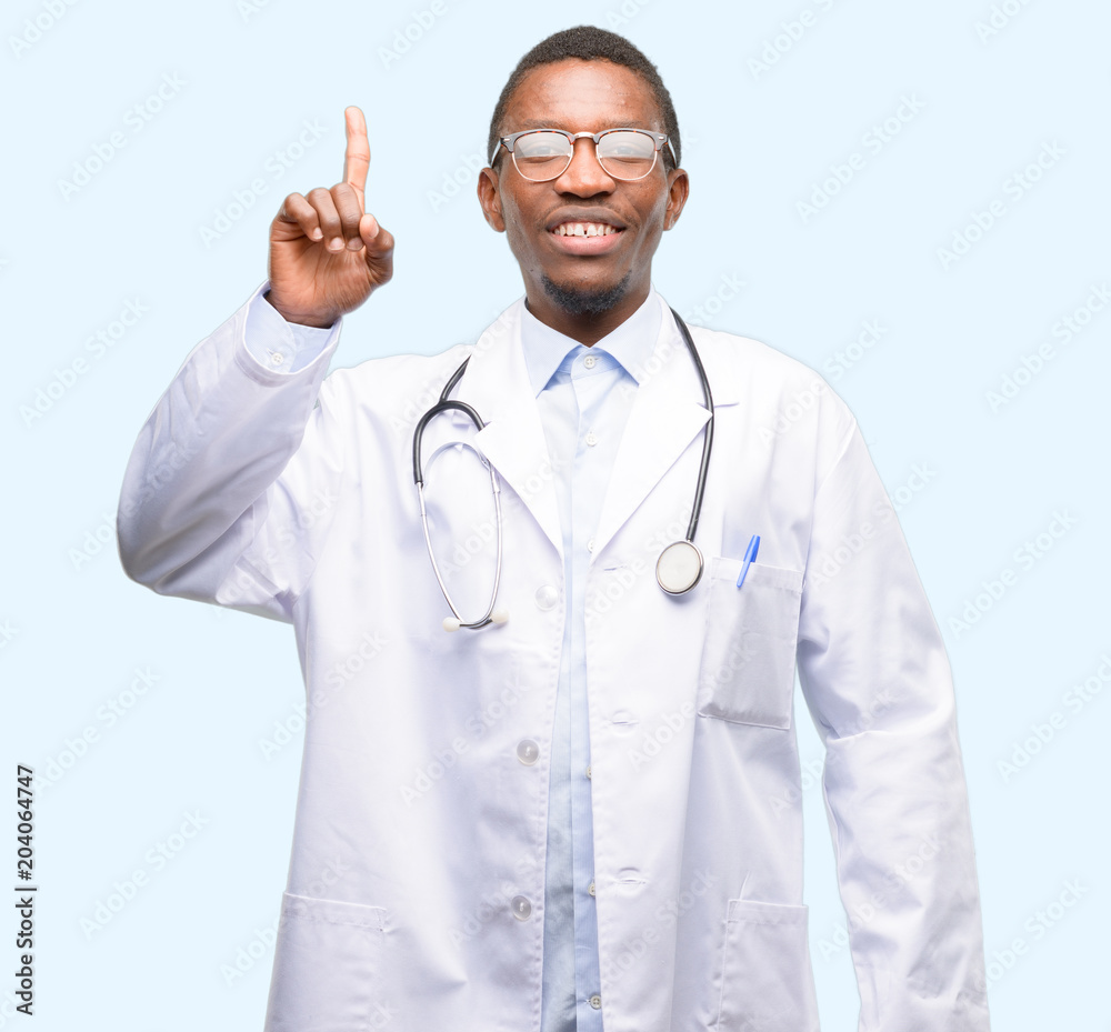 Young black doctor, medical professional raising finger, the number one
