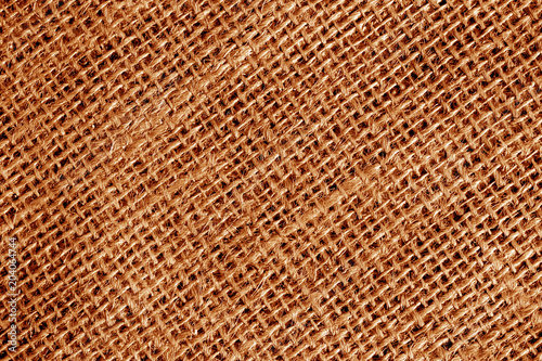 Cotton fabric texture in orange color.
