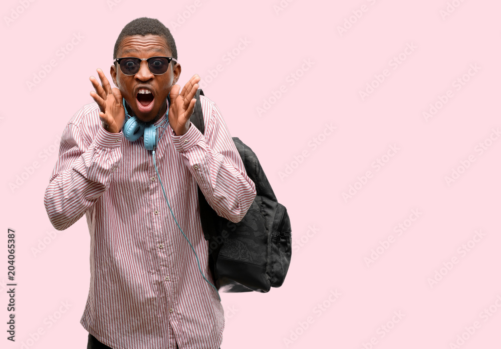 African black man student stressful keeping hands on head, terrified in panic, shouting African black man student stressful keeping hands on head, terrified in panic, shouting