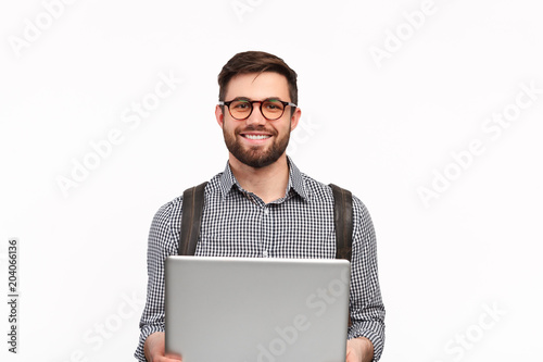 Content student with laptop on white