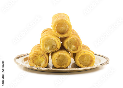 Sweet Dish Puff Roll with Cream Also Know As Homemade Cream Roll, Bakery Food Isolated on White Background