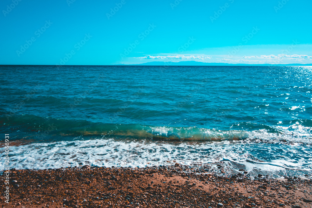 beach with sea and small waves beach with sea and small waves
