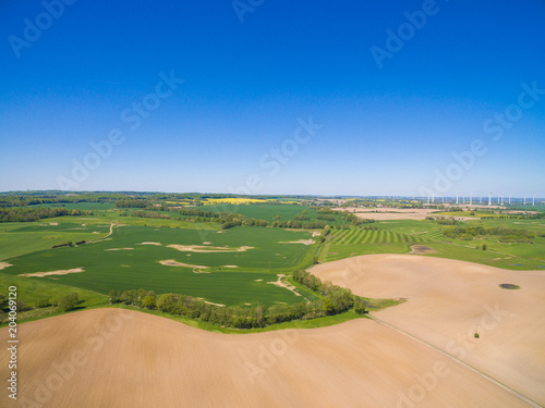 aerial view of freshly plowed agricultural fields ready to sowing 