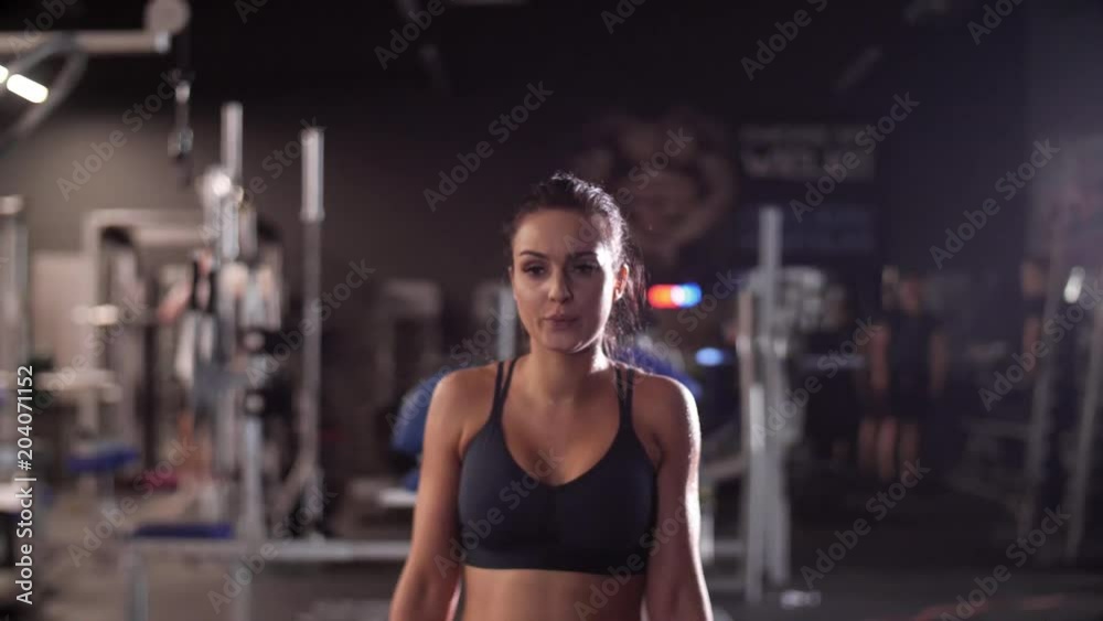 Woman with dumbbell exercising Woman with dumbbell exercising