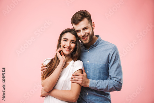 Portrait of a beautiful young couple hugging