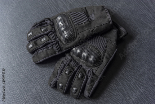  Motorcycle gloves on a gray background