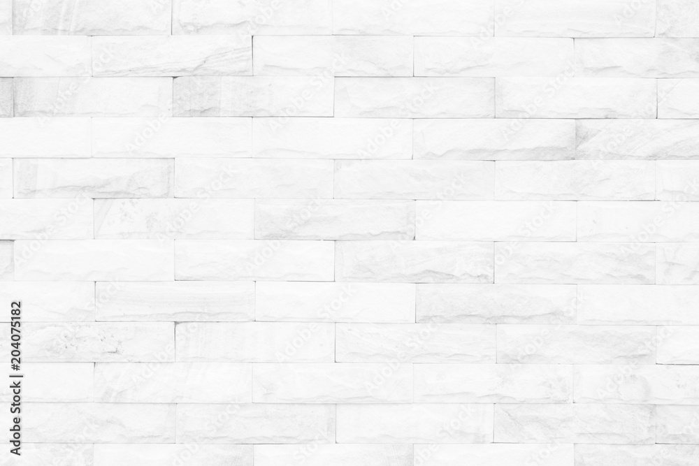 Cream and white brick wall texture background. Brickwork or stonework flooring interior rock old pattern clean concrete grid uneven bricks design stack. Cream and white brick wall texture background. Brickwork or stonework flooring interior rock old pattern clean concrete grid uneven bricks design stack.
