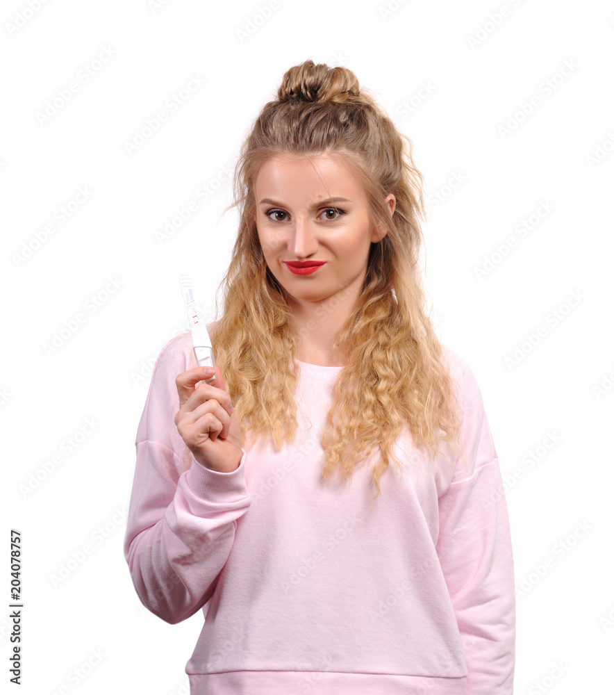Shocked upset woman looking at pregnancy test Shocked upset woman looking at pregnancy test