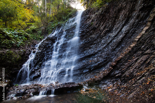 Waterfall Huk in the Carpathian mountains photo