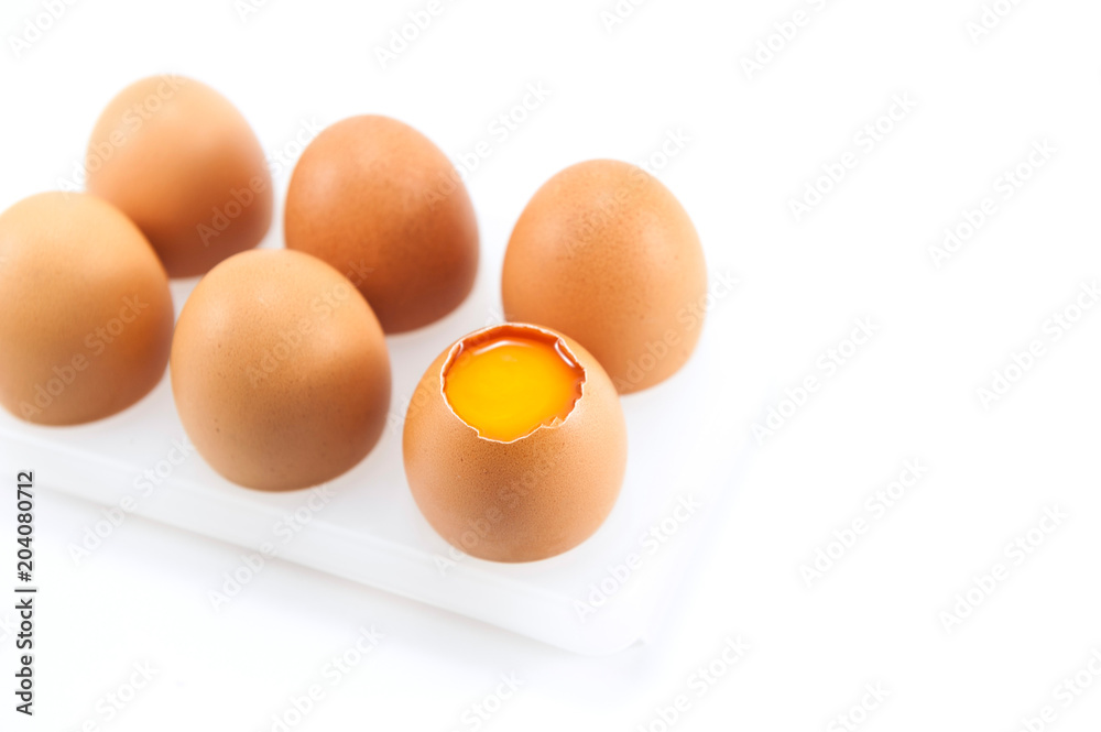 Cracked brown chicken eggs Cracked brown chicken eggs