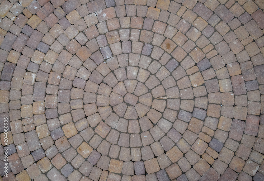 Fototapeta premium Background texture of paving slabs in circles.