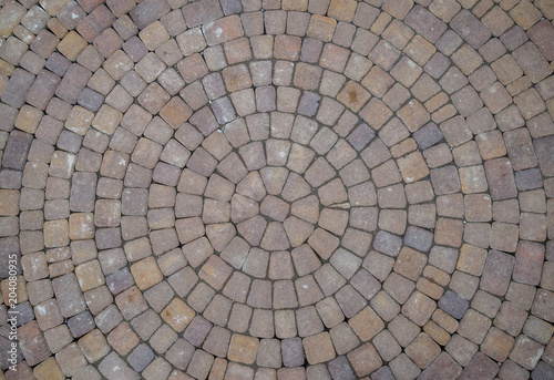 Background texture of paving slabs in circles.