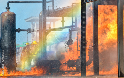 Fire fighters battling a blaze at oil pipeline refinery 
