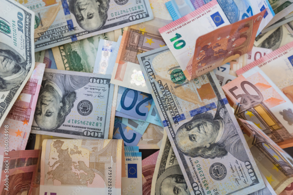 Fototapeta premium dollar and euro banknotes