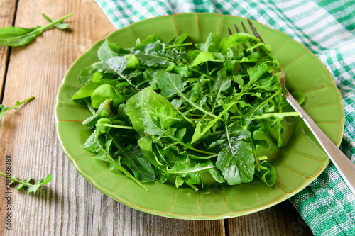 Fresh green home arugula leaves  rucola. Salad.