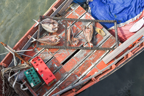 Fish driying on a boat at Ao Yai photo