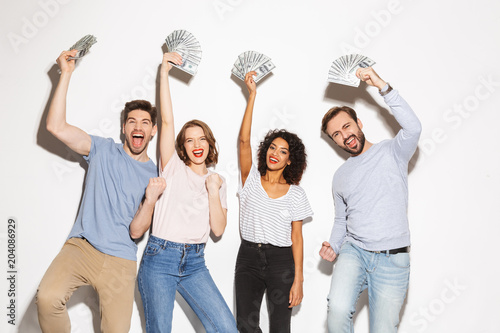 Group of happy multiracial people holding money banknotes