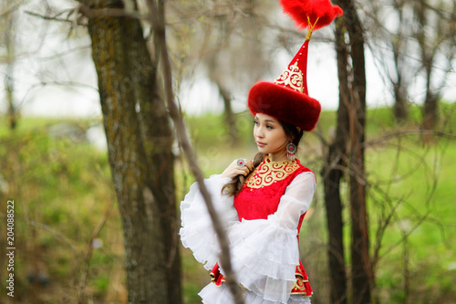 beautiful kazakh woman in national dress photo