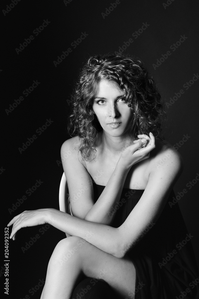 female portrait in a dark hall,