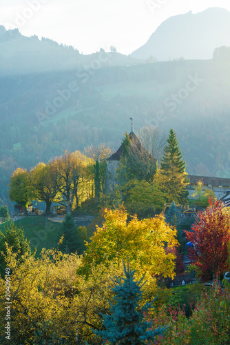 Landscape with a castle and autumn forest, Gruyeres, Switzerland