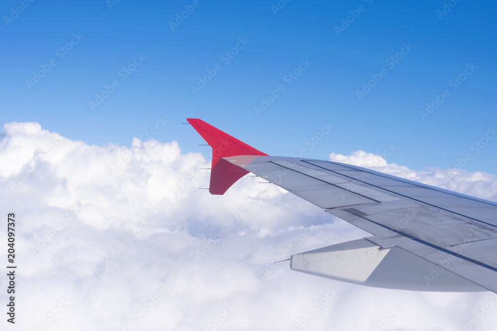 Plane wing from window seat view. Plane wing from window seat view.
