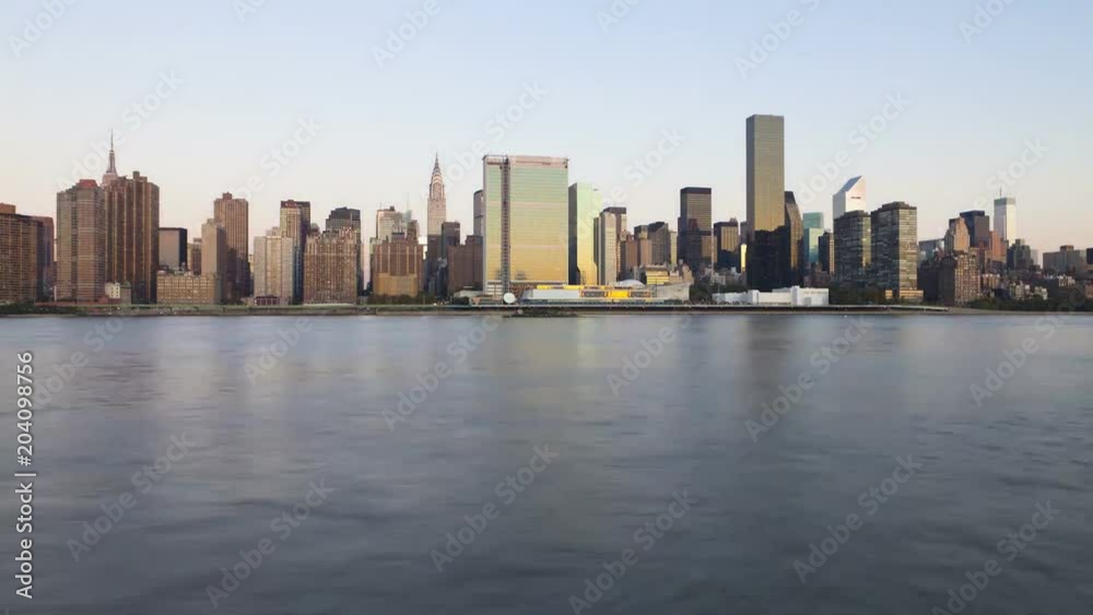 Gorgeous steady day to night time lapse panorama view on evening light illumination on modern towers of New York skyline Gorgeous steady day to night time lapse panorama view on evening light illumination on modern towers of New York skyline