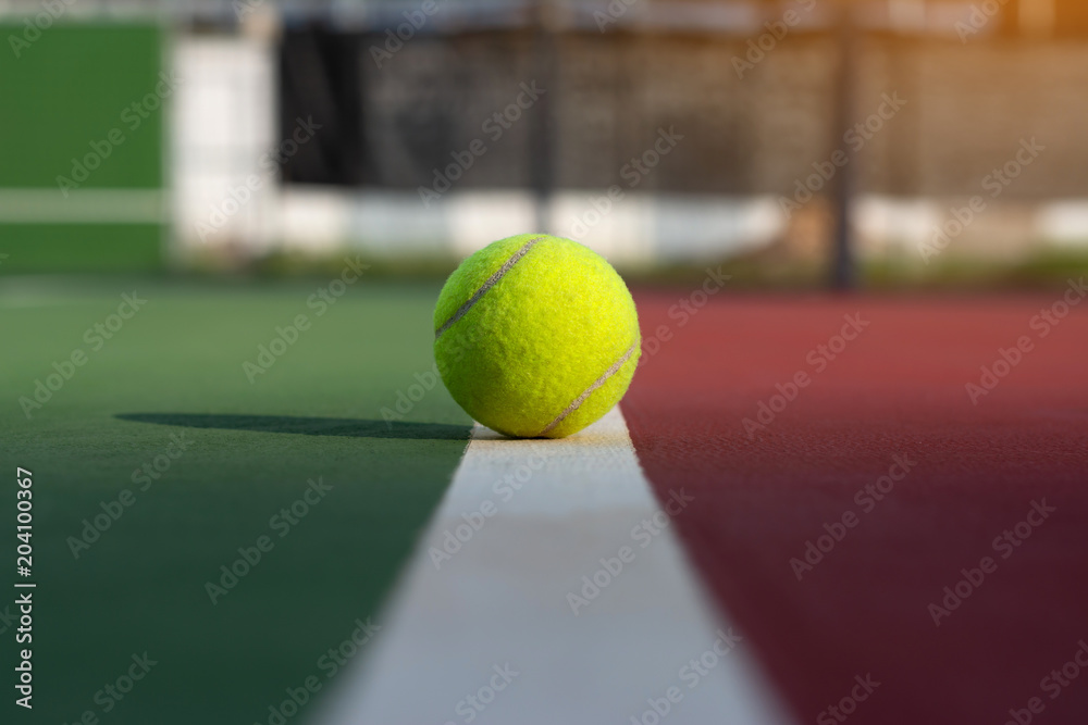 Tennis ball on court two tone background