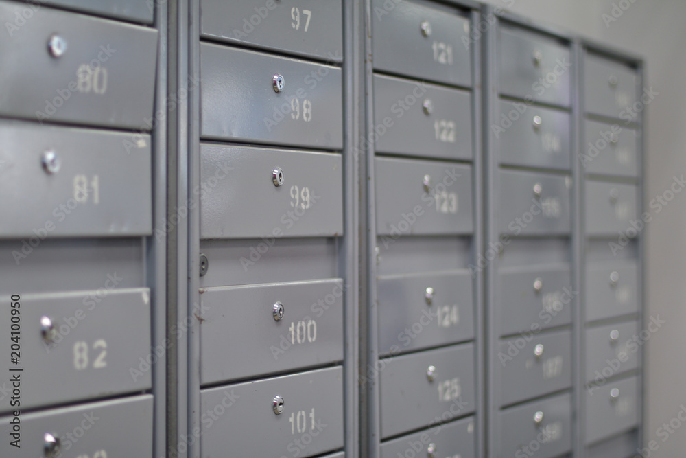 Locker iron mailboxes postal with numbering and key  for keep your information. Row, row of drawers, postal, newspaper, locker. Small storage compartment made