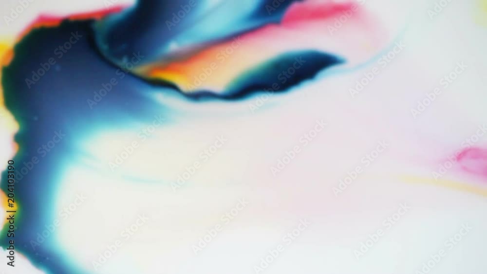 Shapes and lines in blue colors expanding and blending while descending