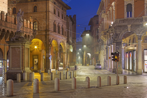 Bologna - The square Piazza della Mercanzia at dusk. photo