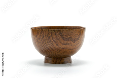 wooden bowl on white background © Yutthana