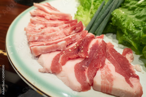 Raw thick sliced pork for "yakiniku" (grilled)