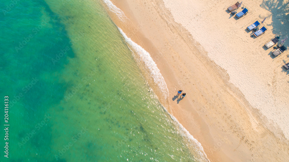 Sea Aerial view and top view, amazing nature background.The color of the water and beautifully bright.Azure beach with rocky mountains and clear