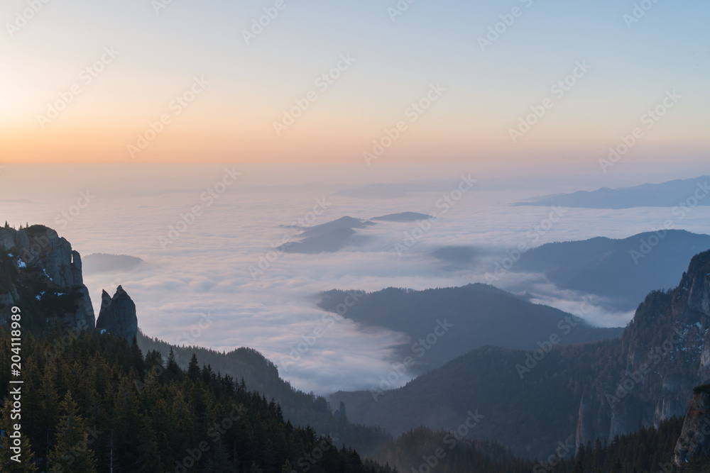 Sunrise over the mountain, in the valley there was a lot of fog