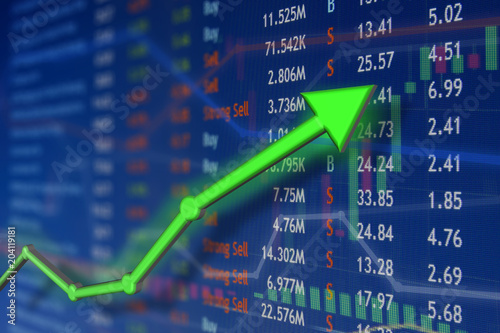 Investing and stock market concept gain and profits with faded candlestick charts.