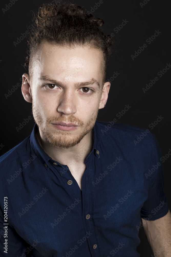 Young ginger man studio portrait