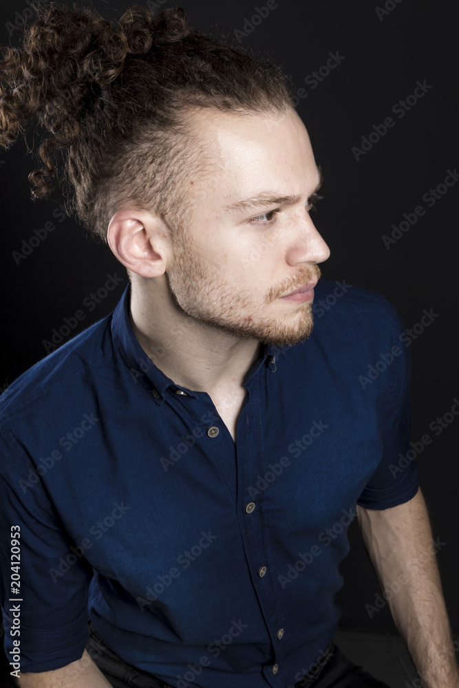 Obraz premium Young ginger man studio portrait