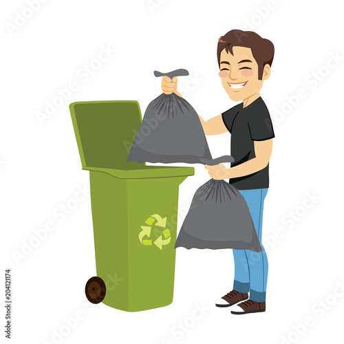 Young man throwing two black bags of trash in big green container