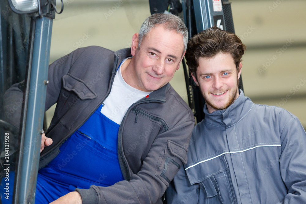 vocational instructor teaching how to drive a forklift vocational instructor teaching how to drive a forklift