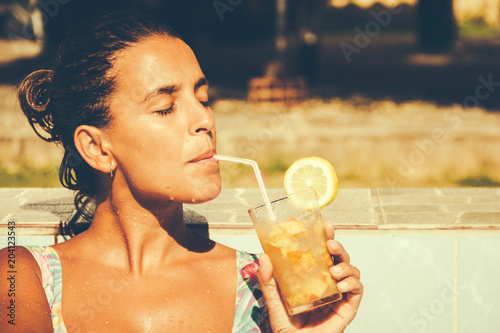 Photography Woman drinking a cocktail in the summer