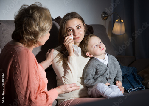 Aged woman is comforting emotional daughter after watching film