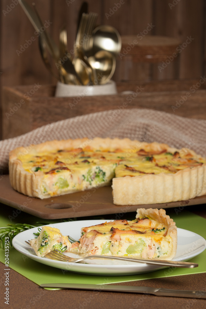 Home Baked Salmon Quiche With Broccoli. Traditional British Food.