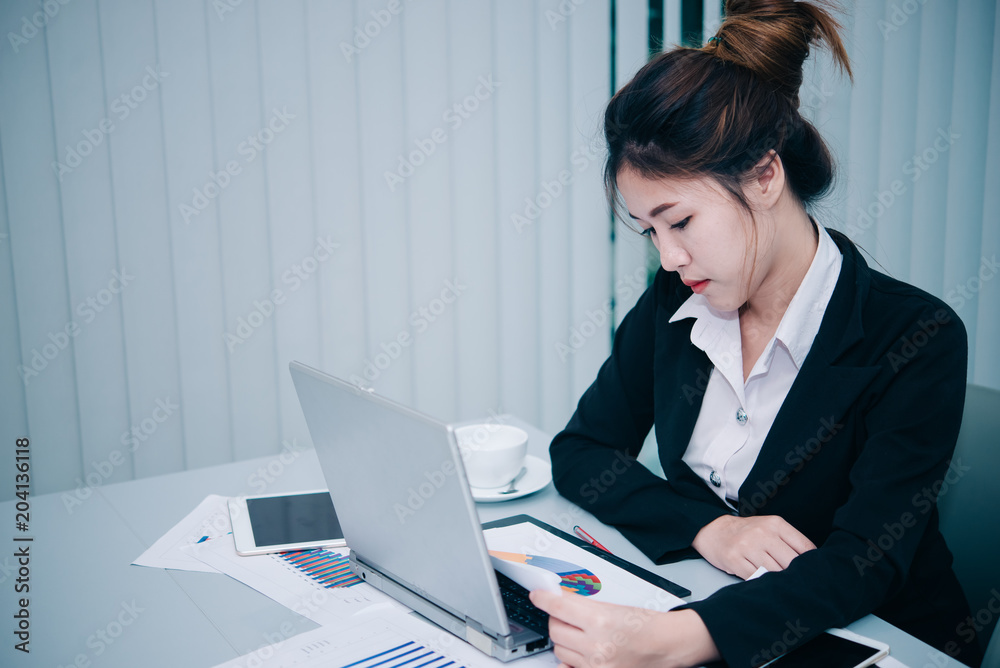 Stress Asian beautiful business woman think work in the office,thailand people,Stress woman concept,Sad from hard work,Serious plan for maketing Stress Asian beautiful business woman think work in the office,thailand people,Stress woman concept,Sad from hard work,Serious plan for maketing