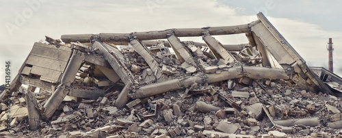 Tableau sur toile Industrial concrete building destructed by strike